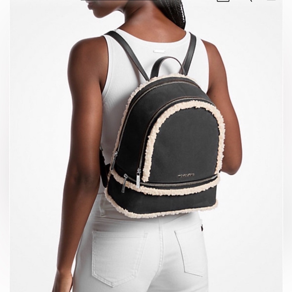 Michael Kors black and Cream Backpack is leather/ fur is faux new bag - Picture 2 of 11